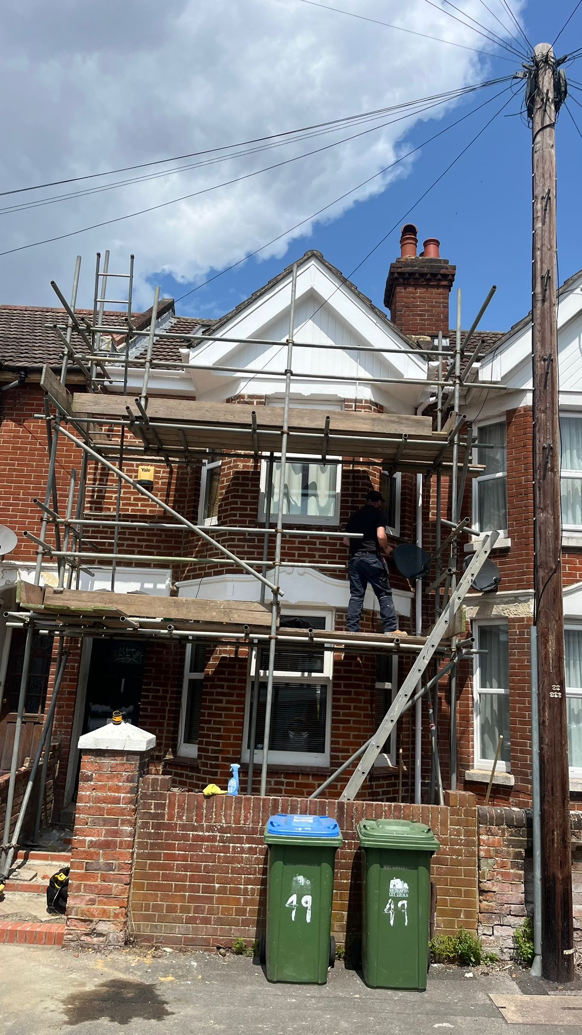 Professional repointing services with scaffolding setup